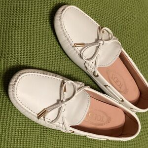 Tod's White Leather Moccasins with Pink Insole and Gold Accents